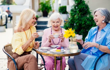 Three women enjoy tea outdoors
